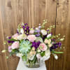 beautiful selection of premium flowers in pinks, lavenders and purples