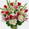 Bouquet of red roses, pink lilies, and white hydrangeas