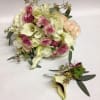 This package comes complete with a bridal bouquet including white hydrangea, blush