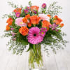 All The Small Things is a refined, vibrant mixed flower arrangement in