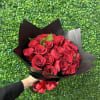25 of our premium red roses wrapped. Accompanied by modern wrap. 
Upgrade
