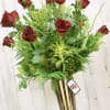 Premium one dozen large headed long stem red roses in a glamorous