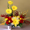 Yellow gerberas, red roses, yellow lily's, white hydrangeas