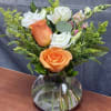 A cheerful burst of color that brightens any space! 
Featuring vibrant orange