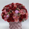 Beautiful burgundy&rsquo;s and shades of pink combined in a velvety hat box