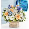 Peach roses and white daisies in a wooden box with a Father's Day balloon.