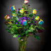 A dozen  rainbow rose assorted in a high end vase 