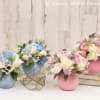 Please note that the price includes only one arrangement. This picture is