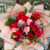 beautiful hand tie bouquet with 8 roses , 8 pink carnation 