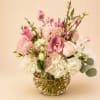 Mixture of roses, orchids, hydrangeas, greenery, spray roses, and more.