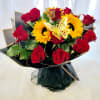 Bouquet of red roses and yellow sunflowers with butterfly picks