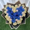 Bouquet of blue and cream roses with Raffaello chocolates