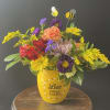 Colorful bouquet in a yellow 
