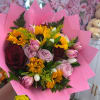 A beautiful wrap with roses, sunflowers and Tullips 