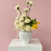 Each arrangement is thoughtfully curated using the freshest, highest-quality blooms available. Specific