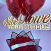 Bouquet of red roses with heart-shaped balloons and a birthday ribbon