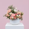 Pink Royale
Bold, full, and fit for a queen. A richly bloomed arrangement