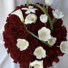The Luxury Rose Dome with Floral Accents is a refined and artistic