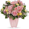Pink rose bouquet in a tall pink vase