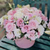 Pink and white rose bouquet in a round pink box