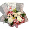 Bouquet of white roses and pink alstroemeria with a Valentine card