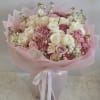 A lush, rounded bouquet of pink and white roses designed to make