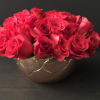 50  red roses in a modern rose gold bowl. She will