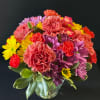 A small arrangement with carnations and daisies