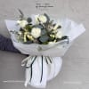 This bouquet is a graceful embodiment of purity and elegance, featuring an