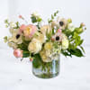 Petaline is a soft, garden-inspired floral arrangement designed with delicate texture, airy