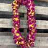 A lush pair of double leis crafted from densely strung purple orchids