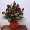 12 roses arrangement in a Bace round 