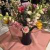 A lively, garden-style flower arrangement that sings of spring-perfect as a birthday