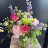A "Summer Dreams" floral arrangement captures the essence of warm, sunlit days