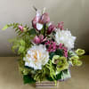 Spring beauty in Silk blossoms of magnolia, peonies, hydrangea, heleborus, woodland fern