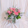 This exquisite display features a dozen stunning Candy X-Pression Garden Roses, known