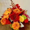 In the glass vase combinations of autumn flowers