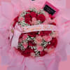 A lush cascade of red and blush-pink roses says celebration the moment