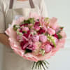 A lush, full hand-tied bouquet bursting with pinks-perfect as a birthday bouquet