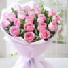 Pink rose bouquet wrapped in pale pink paper