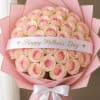 A dense cluster of pale pink roses forms an instant mood of