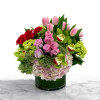 beautiful bright bouquet in a crystal cylinder vase with green, pink hydrangeas