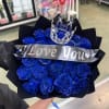 Bouquet of blue roses with a crown and 