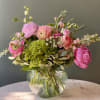 Lowcountry Garden is a lush, low-profile floral arrangement designed in a clear