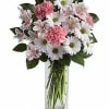 A sleek and contemporary floral arrangement featuring a delicate blend of white