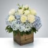 A modern and stylish arrangement designed with clean lines and natural charm.