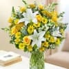 A graceful florist-choice sympathy arrangement featuring a beautiful selection of fresh seasonal