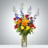 A bold and modern vase arrangement bursting with color and texture. This