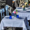 custom order simple arrangements for your restaurant tables. flowers vary week to