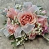 Pink rose bouquet with white filler flowers and sheer ribbon